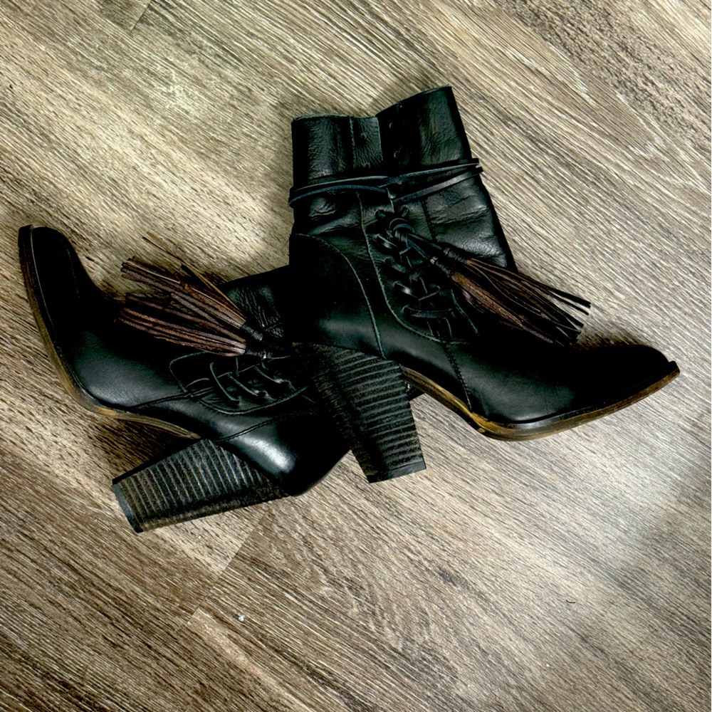 Black pointed toe heeled ankle boots with tassels. Charles David. Size 7.5